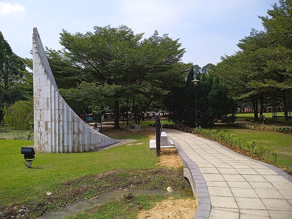 A shaded walkway through the ASEAN Sculpture Garden in Kuala Lumpur.
