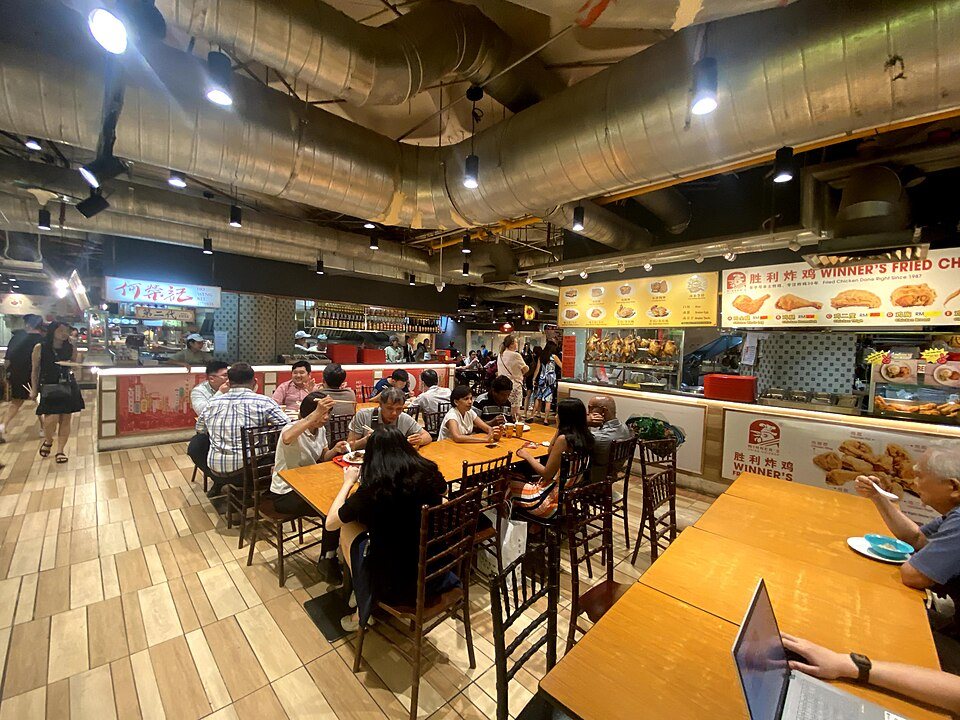 Food stalls and seating inside Lot 10 Hutong.