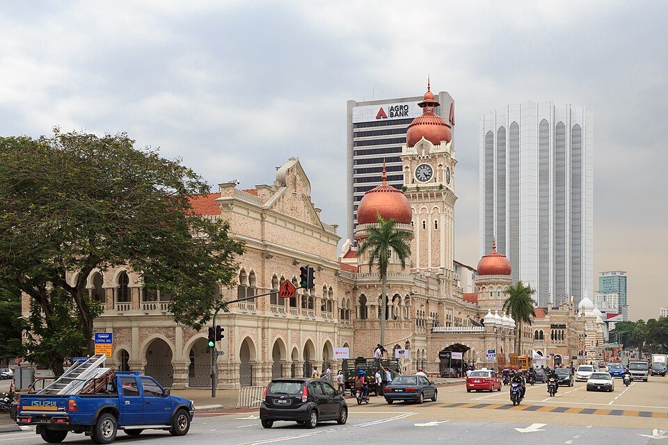 The clock tower and copper domes of the Sultan Abdul Samad Building.