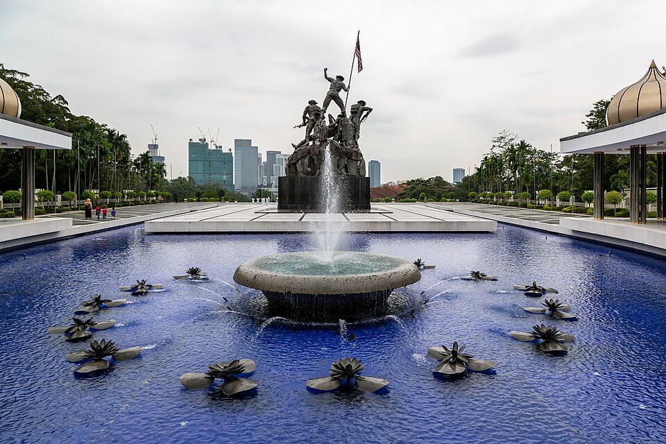The National Monument beyond its reflecting pool and fountain.