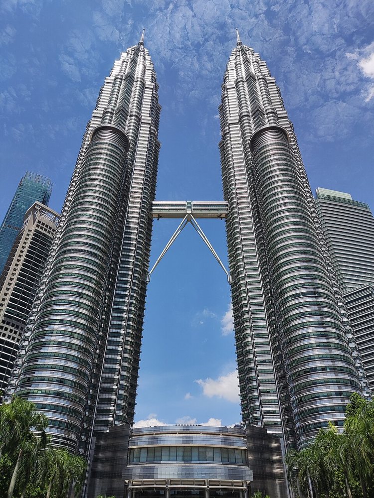 Petronas Twin Towers and their skybridge, seen from below.